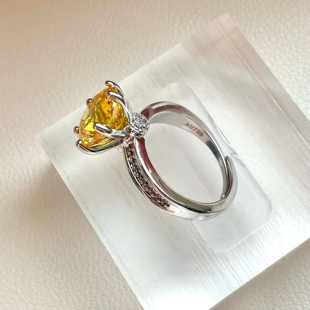 Sterling Silver Ring with Yellow Round Center Stone